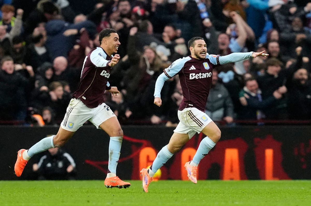 Aston Villa and Arsenal players in action during a Premier League match at Villa Park