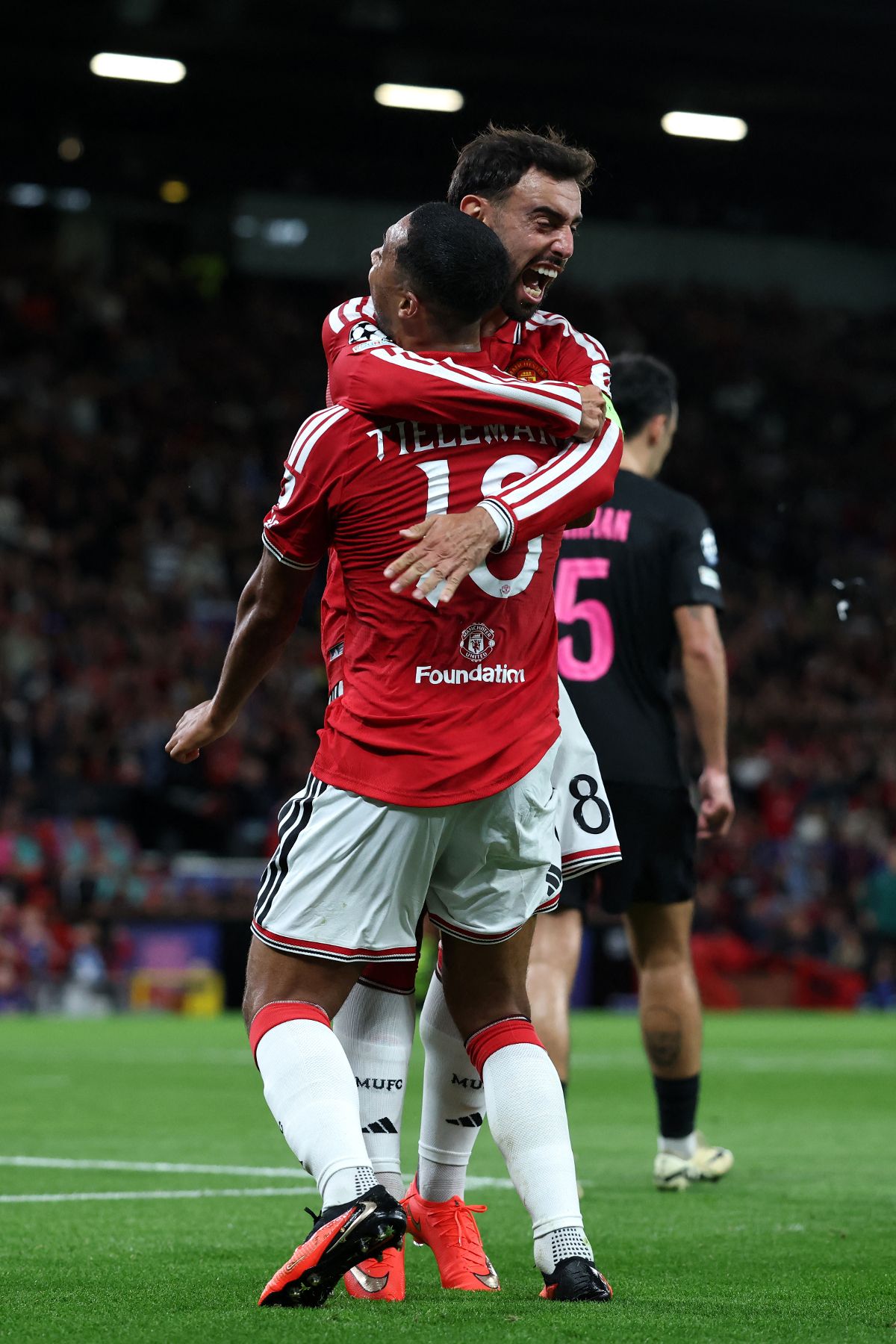 Manchester United players celebrating after a UEFA Champions League match against Sabah