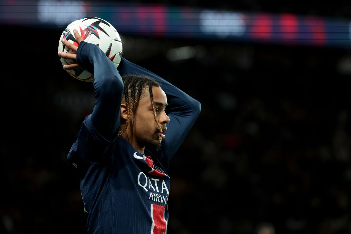 Paris Saint-Germain players during a Ligue 1 match, illustrating marquee transfer targets like Bradley Barcola