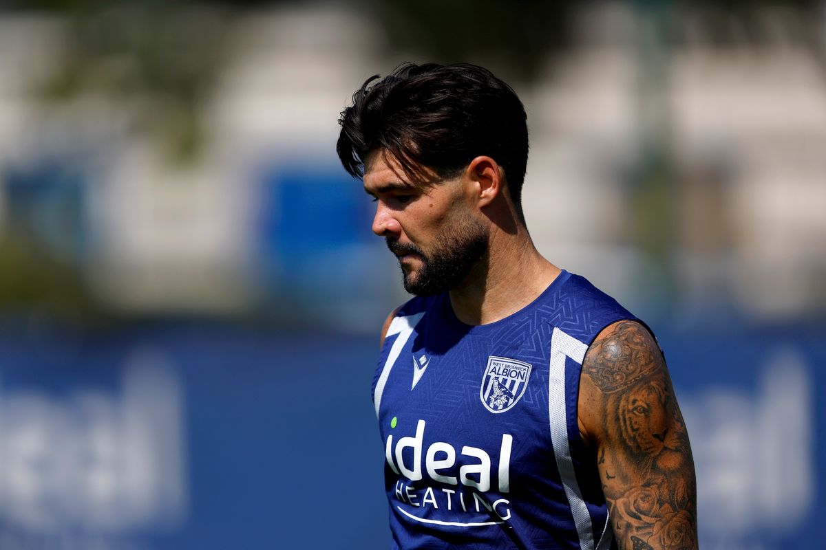 Alex Mowatt during a football match, representing the transfer market activity in England