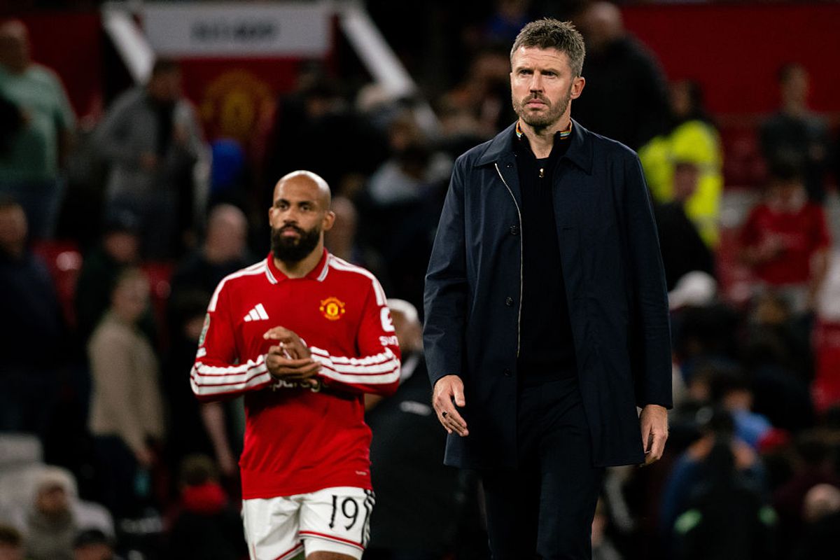 Michael Carrick on the sidelines giving instructions during a Manchester United match