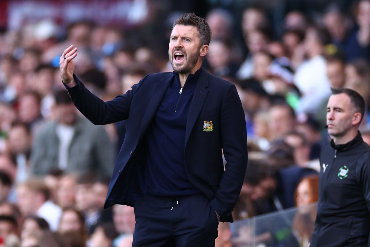 Michael Carrick addressing the press during a Premier League post-match conference